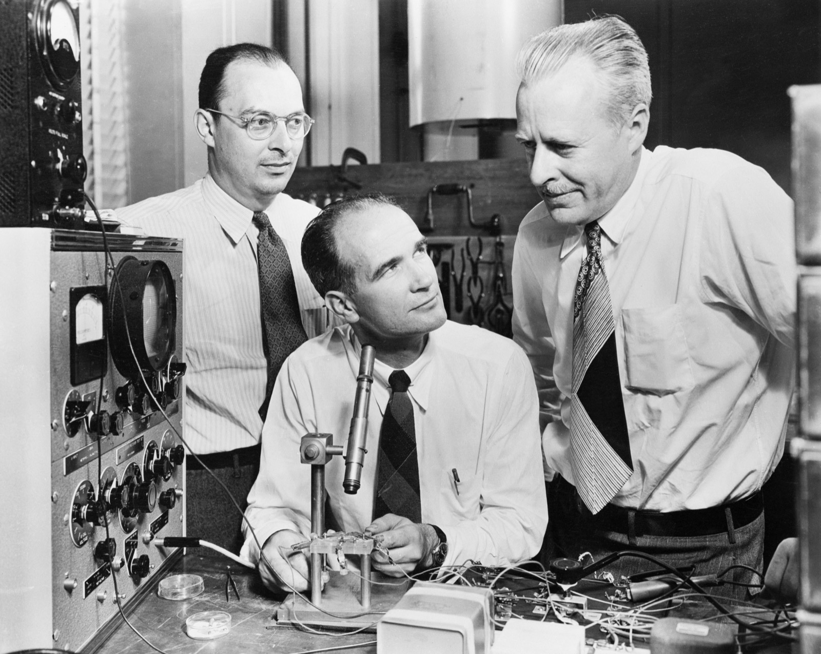 The three Bell Labs physicists credited with the transistor, in one of the publicity photographs AT&T issued around the 1948 public announcement.
