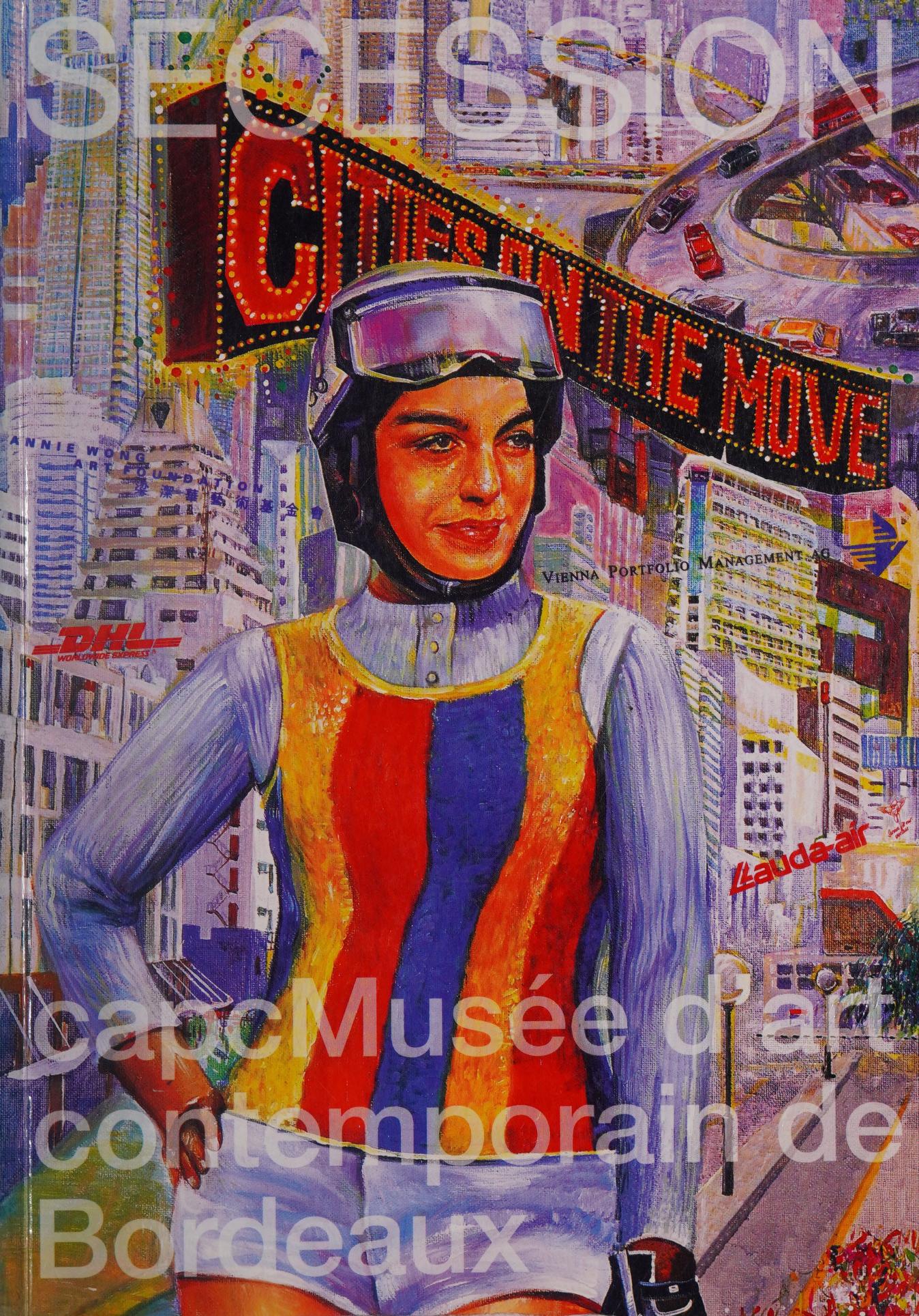 The front cover of the Cities on the Move exhibition catalogue, carrying the Secession and capcMusee credits and a painted cityscape with the exhibition title as an illuminated sign.