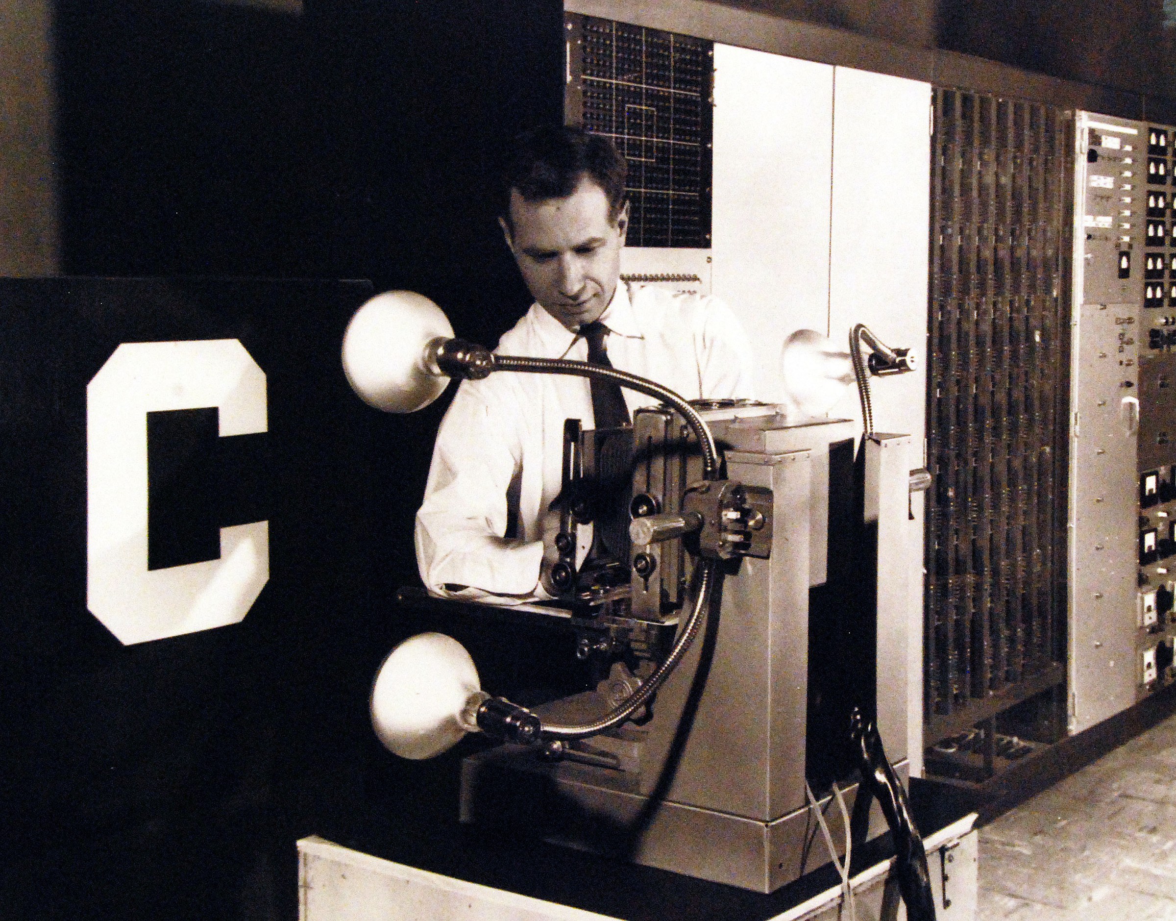 A U.S. Navy photograph of the Mark I Perceptron, the machine built to run Rosenblatt’s design, with an operator at its image sensor.
