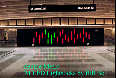 A Bill Bell LED 'Lightstick' persistence-of-vision installation at Seattle Metro, photographed on the artist's own site. Bell was one of the exhibitors at Les Artistes et la Lumière; this is a different installation, not a photograph of the Reims exhibition.