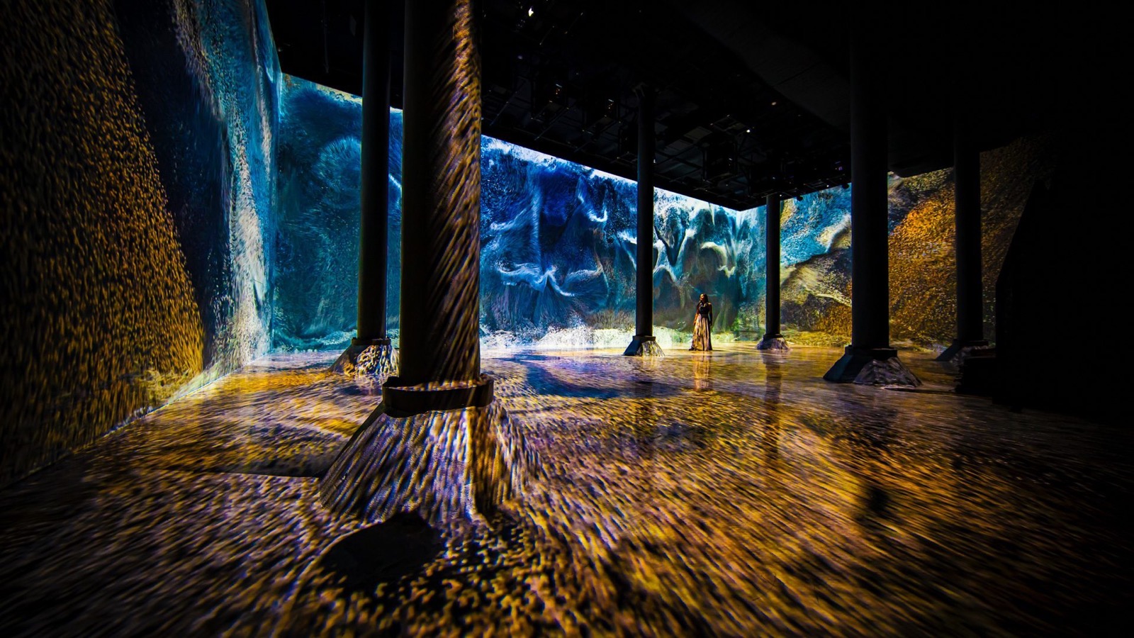 Installation photograph of Refik Anadol's immersive projection MACHINE HALLUCINATION at ARTECHOUSE NYC.