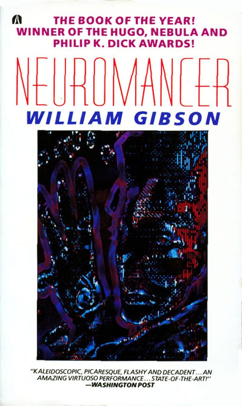 White Neuromancer paperback cover with red title, blue author lettering and a dark cyberpunk illustration.
