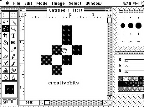 Black-and-white Macintosh Photoshop interface showing its tool palette, brush settings and an open image with a pixelated Creativebits mark.
