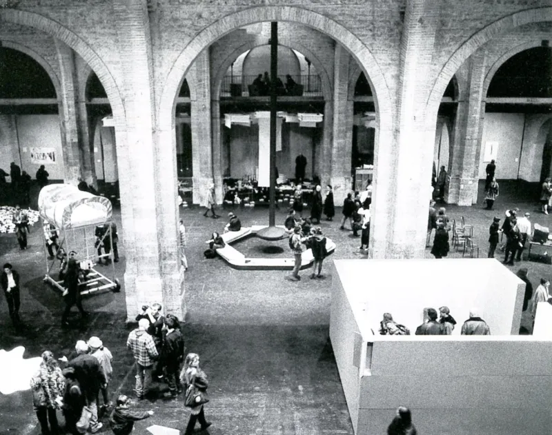 Visitors and installations fill the arched galleries of the Traffic exhibition.