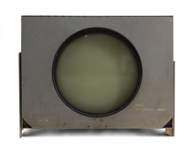 The circular cathode-ray-tube monitor used with MIT's Whirlwind, the display on which the first real-time computer graphics — and, with the light gun and Douglas Ross's Scope Input Program, the first hand-drawing on a computer — were made.